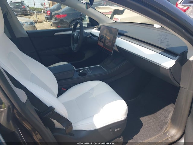 2023 TESLA MODEL Y 7SAYGDEE5PF784586 Photo 4