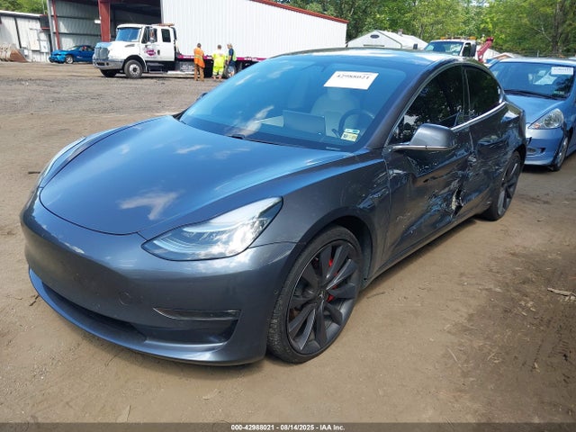 5YJ3E1EC2LF736371 Tesla 2020