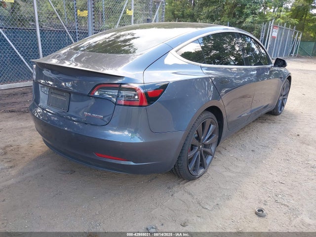 5YJ3E1EC2LF736371 Tesla 2020