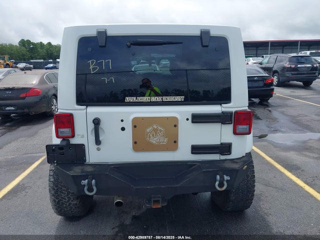 2014 Jeep Wrangler Unlimited Sahara მანქანა იყიდება აუქციონზე, vin: 1C4BJWEG6EL324123, აუქციონის ნომერი: 42989757