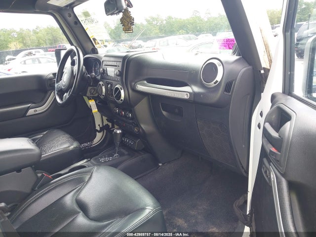 2014 Jeep Wrangler Unlimited Sahara მანქანა იყიდება აუქციონზე, vin: 1C4BJWEG6EL324123, აუქციონის ნომერი: 42989757