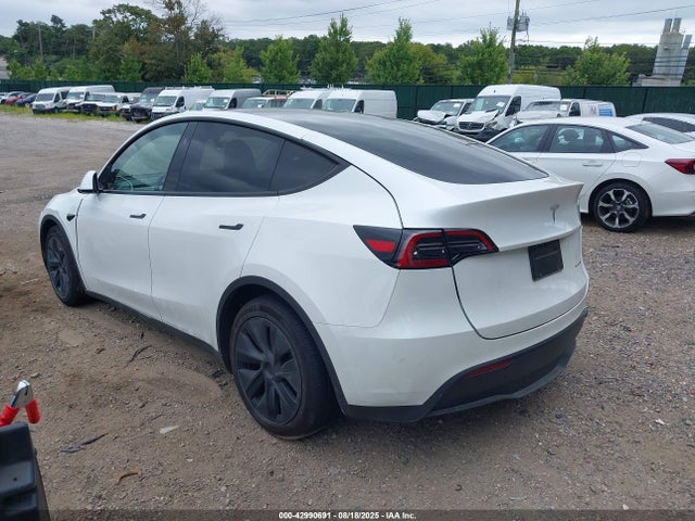 2025 TESLA MODEL Y 7SAYGAEE4SF295362 Photo 2