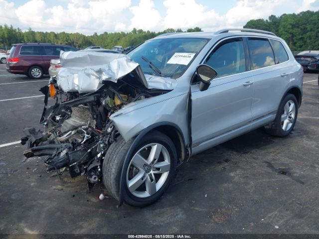 2012 VOLKSWAGEN TOUAREG WVGFF9BP1CD000363 Photo 1
