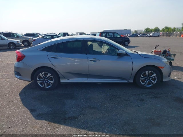 Продажа на аукционе авто 2018 Honda Civic Lx, vin: 2HGFC2F59JH528196, номер лота: 42994353