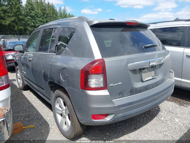 1C4NJDBB6ED586261 Jeep 2014