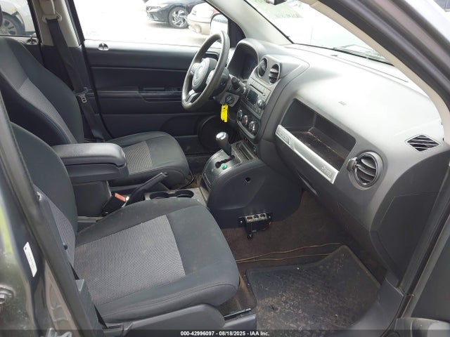 1C4NJDBB6ED586261 Jeep 2014