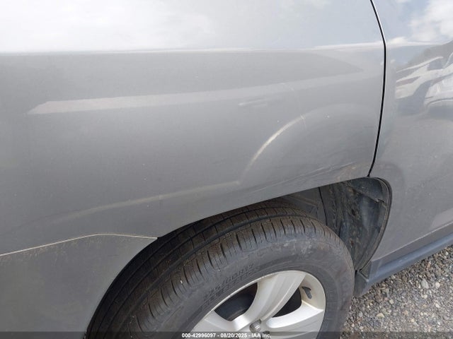 1C4NJDBB6ED586261 Jeep 2014