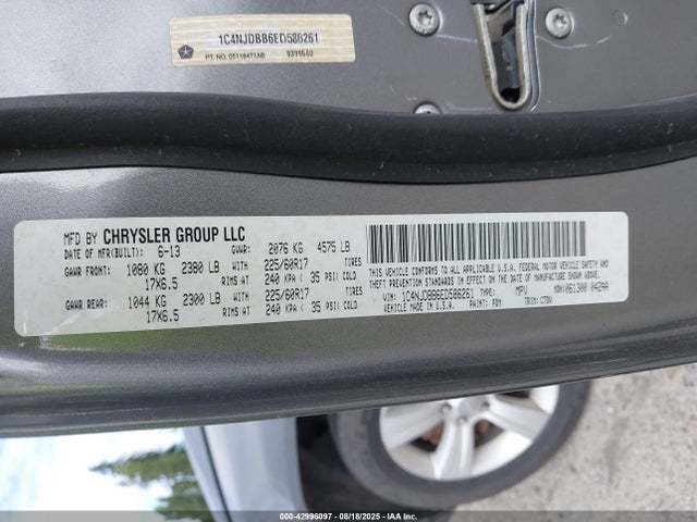 1C4NJDBB6ED586261 Jeep 2014