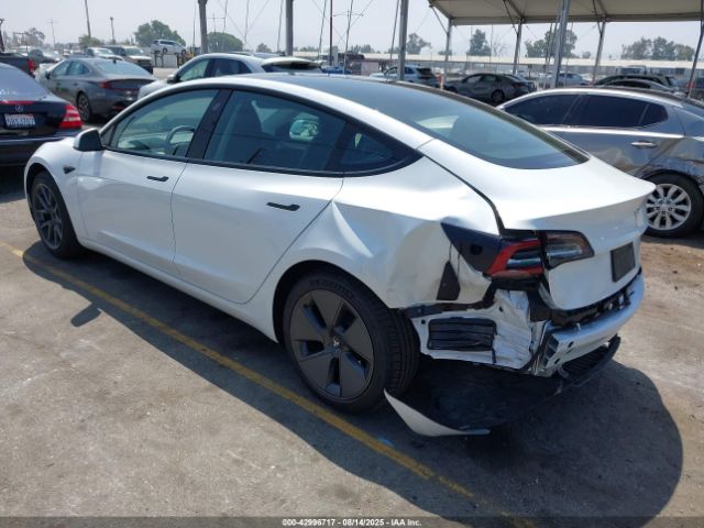 2023 TESLA MODEL 3 5YJ3E1EA9PF499043 Photo 2