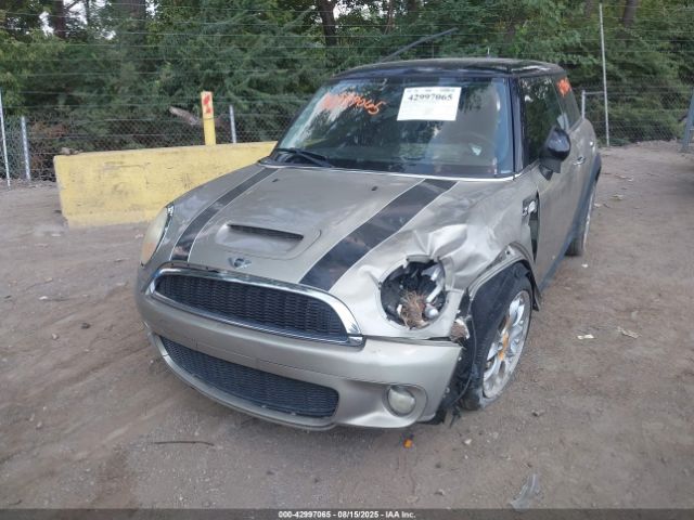 2009 MINI COOPER S WMWMF73599TW80893 Photo 1