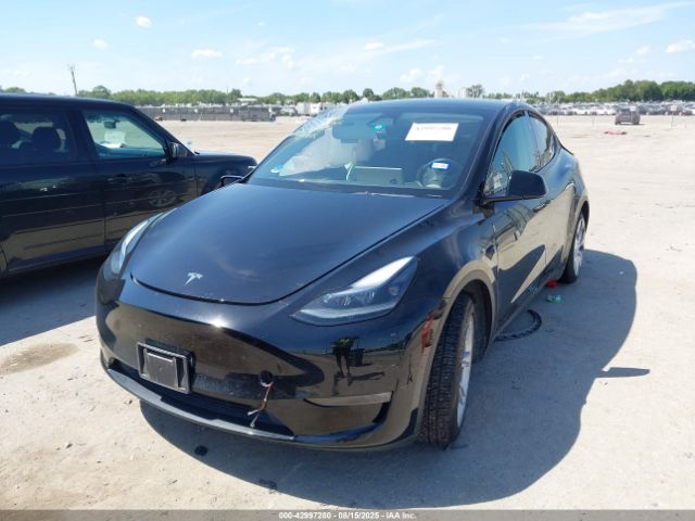 2023 TESLA MODEL Y 7SAYGAEE9PF899481 Photo 1