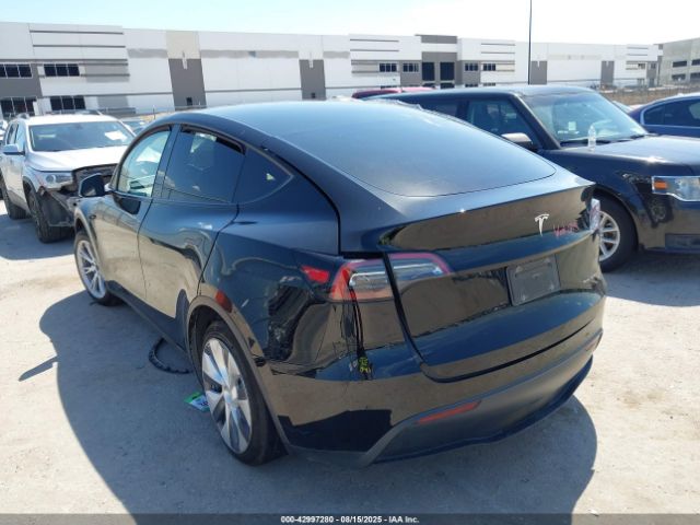 2023 TESLA MODEL Y 7SAYGAEE9PF899481 Photo 2