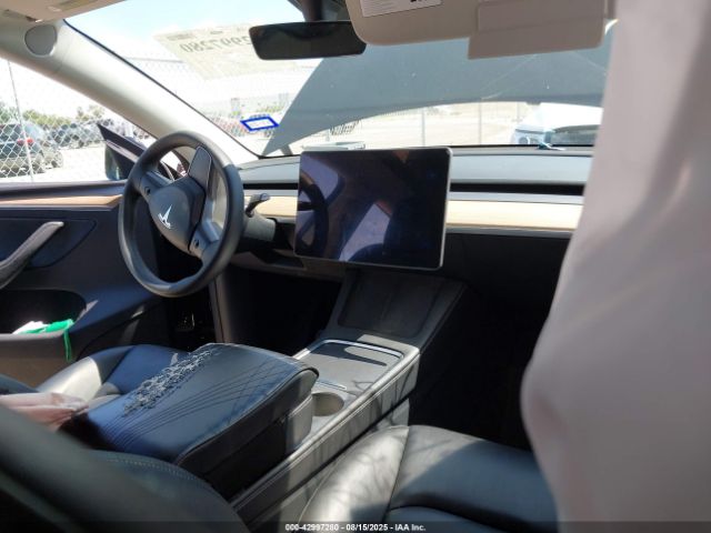 2023 TESLA MODEL Y 7SAYGAEE9PF899481 Photo 4