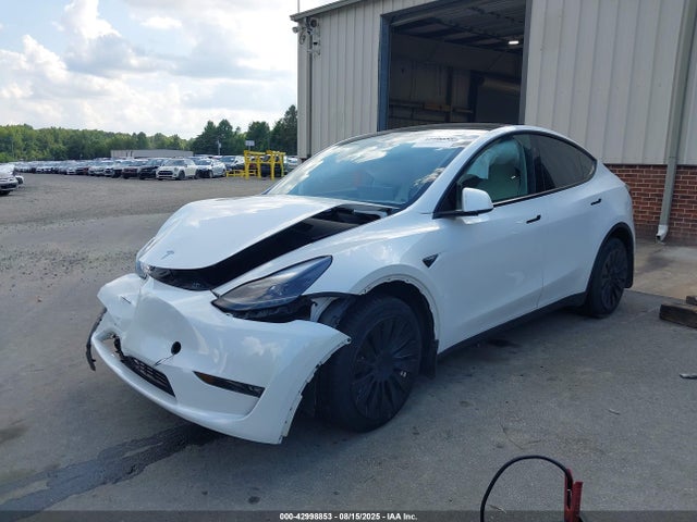 2023 TESLA MODEL Y 7SAYGDEE1PF799182 Photo 1