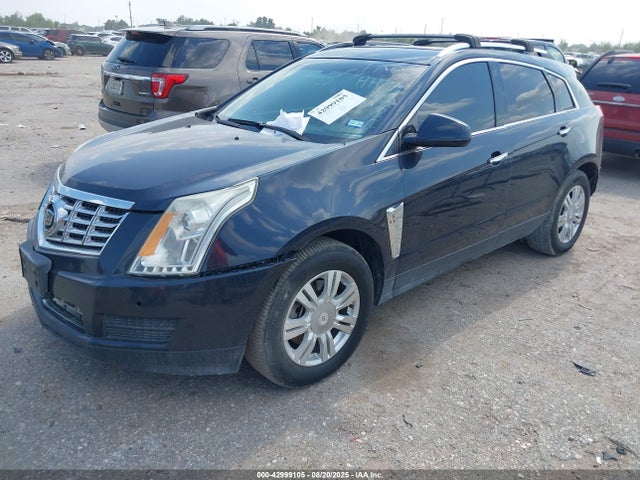 2014 CADILLAC SRX 3GYFNEE38ES582032 Photo 1