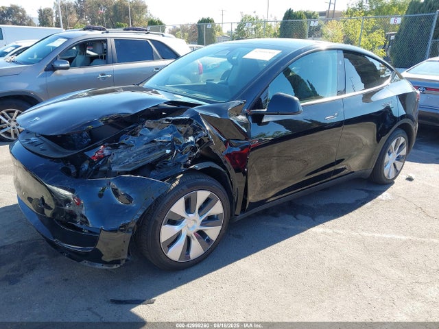 2024 TESLA MODEL Y 7SAYGDED5RF054445 Photo 1