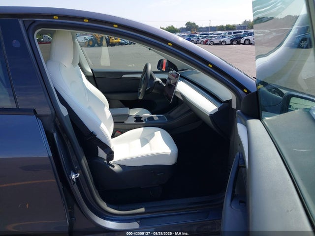 2023 TESLA MODEL Y 7SAYGAEE5PF925445 Photo 4