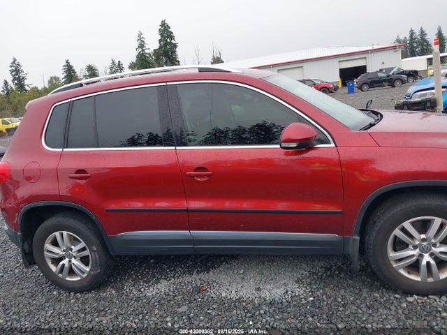 WVGBV3AXXEW060505 Volkswagen Tiguan