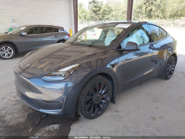 2023 TESLA MODEL Y 7SAYGDEF5PF884650 Photo 1