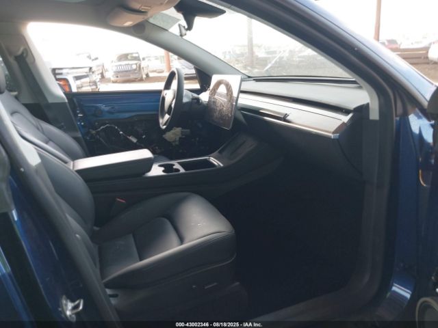 2023 TESLA MODEL Y 7SAYGDEF9PF709592 Photo 4