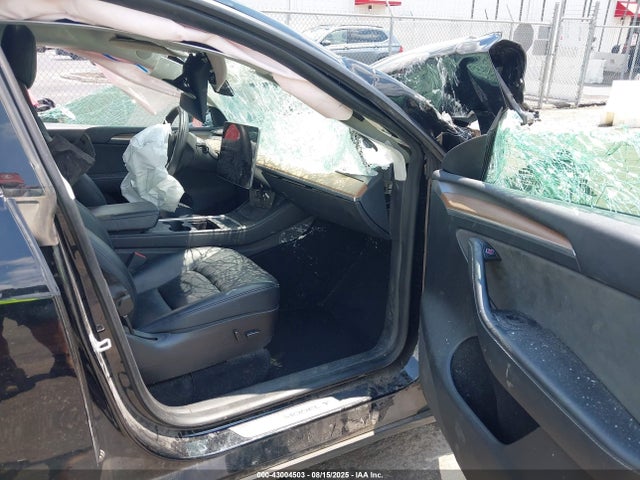 2023 TESLA MODEL Y 7SAYGAEE1PF632979 Photo 4