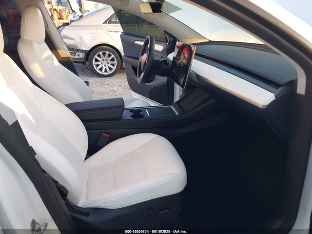 2023 TESLA MODEL Y 7SAYGDEE9PA146600 Photo 4