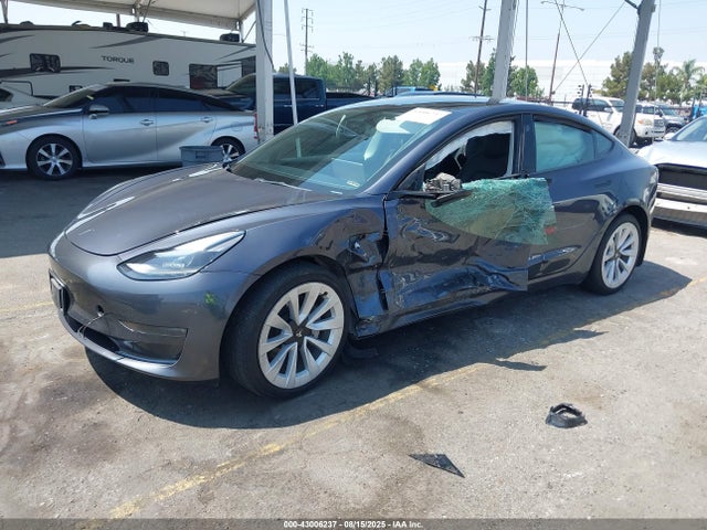 Tesla 2022 2022 5YJ3E1EB3NF290533 Image 2
