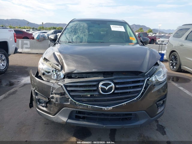 JM3KE2CY6G0900829 Mazda py