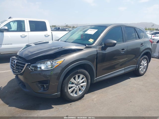 JM3KE2CY6G0900829 Mazda py