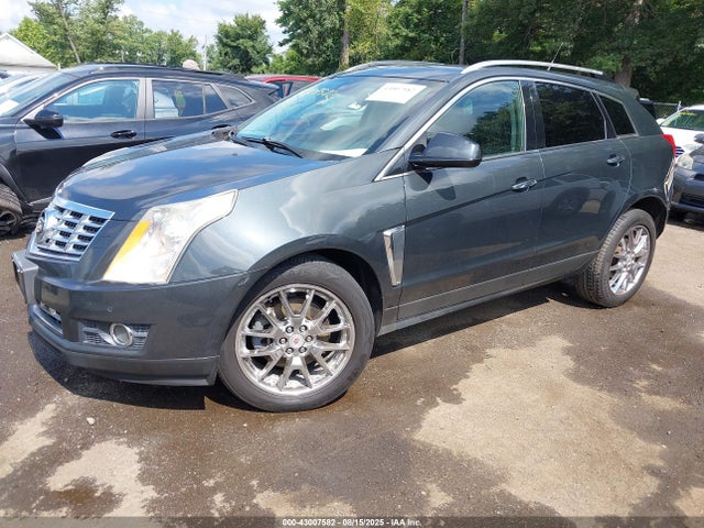 2014 CADILLAC SRX 3GYFNFE30ES662026 Photo 1