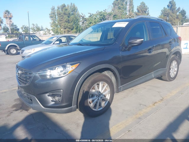 JM3KE2CY0G0854270 Mazda py