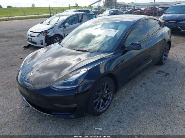 2023 TESLA MODEL 3 5YJ3E1EB2PF616468 Photo 1