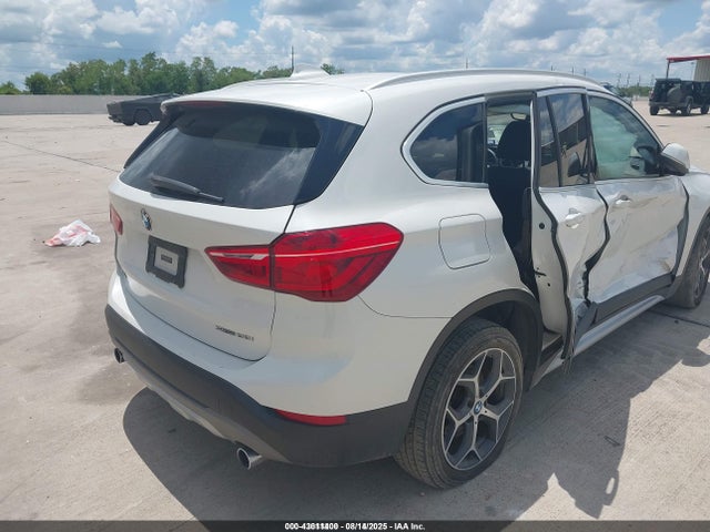 WBXHU7C31J5L08808 BMW X1