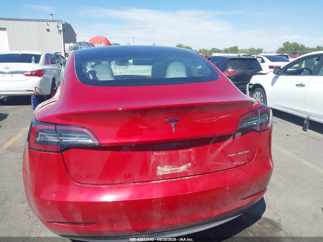 5YJ3E1EB9JF086412 Tesla 2018