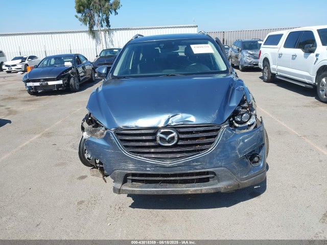 JM3KE2DY9G0668029 Mazda py