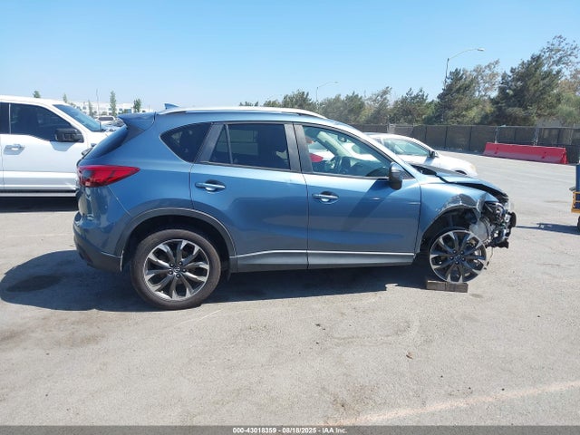 JM3KE2DY9G0668029 Mazda py