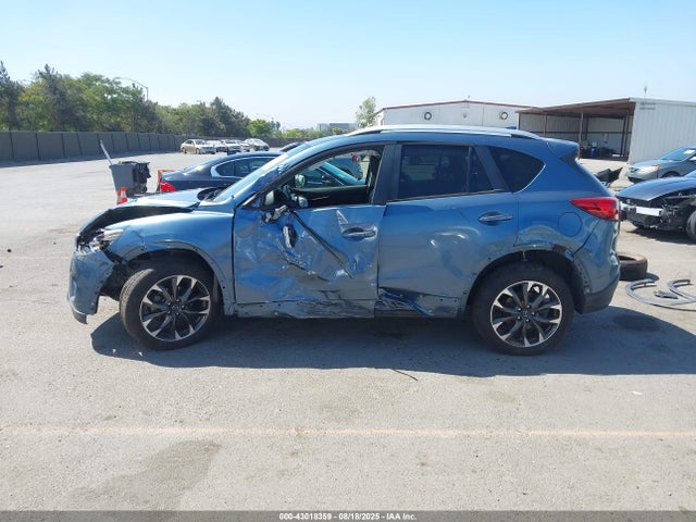 JM3KE2DY9G0668029 Mazda py
