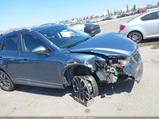 JM3KE2DY9G0668029 Mazda py