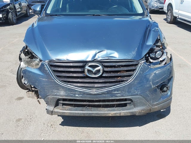 JM3KE2DY9G0668029 Mazda py