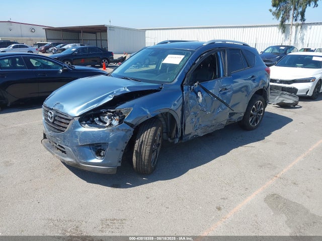 JM3KE2DY9G0668029 Mazda py