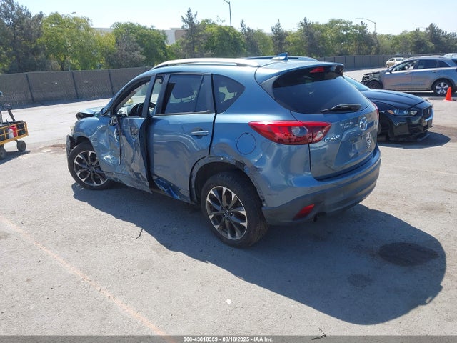 JM3KE2DY9G0668029 Mazda py