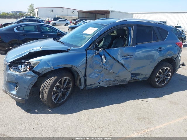 JM3KE2DY9G0668029 Mazda py