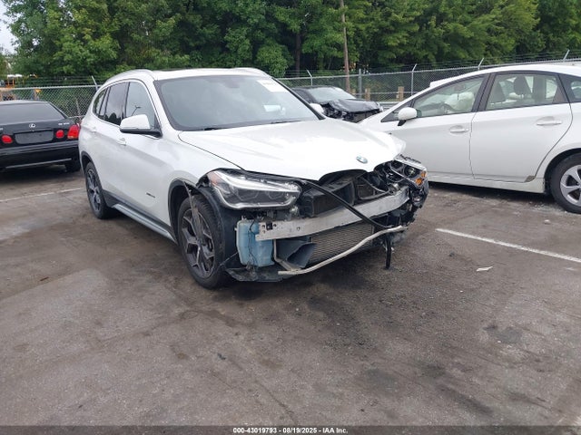 2016 BMW X1 WBXHT3C33GP880276