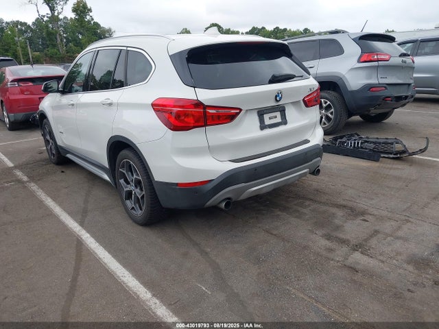 2016 BMW X1 WBXHT3C33GP880276 Photo 2