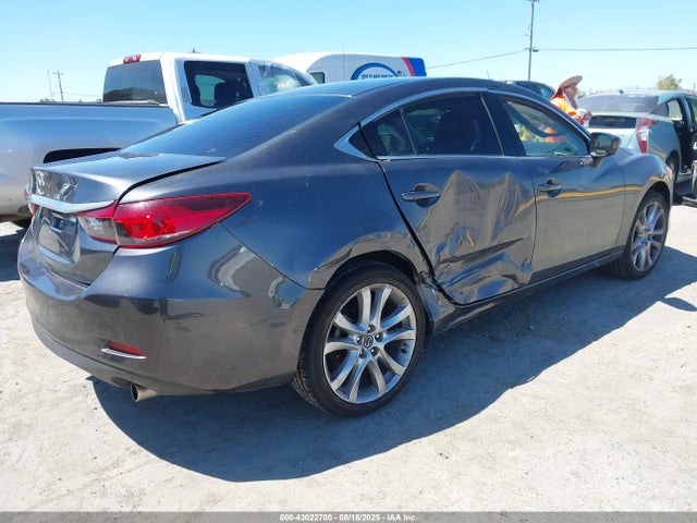 JM1GJ1V52G1479354 Mazda py