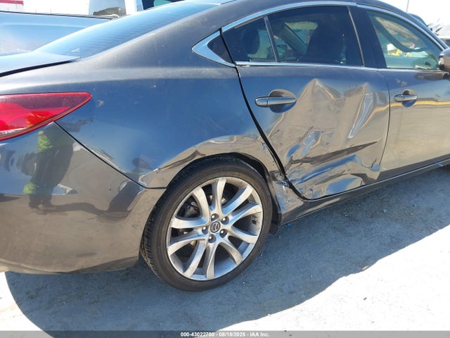 JM1GJ1V52G1479354 Mazda py