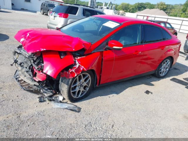 2015 FORD FOCUS 1FADP3F22FL228683 Photo 1