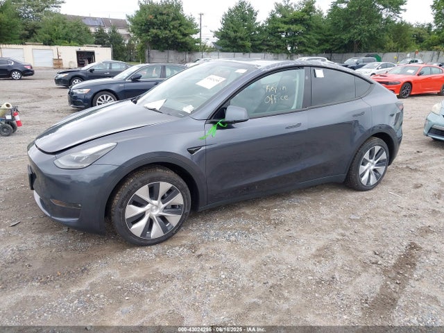 2023 TESLA MODEL Y 7SAYGDEE0PF882120 Photo 1
