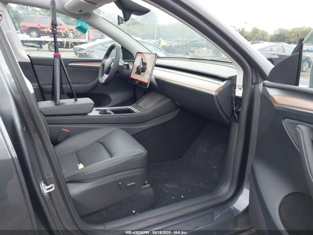 2023 TESLA MODEL Y 7SAYGDEE0PF882120 Photo 4