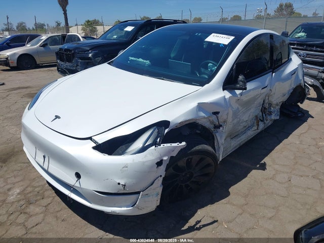 2022 TESLA MODEL Y 7SAYGDEF4NF536139 Photo 1